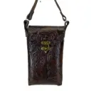 PORTACEL VAQUETA CINCELADA