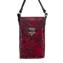 PORTACEL VAQUETA CINCELADA