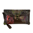 MUÑEQUERA VAQUETA CINCELADA 