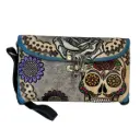 MUÑEQUERA VAQUETA CINCELADA 